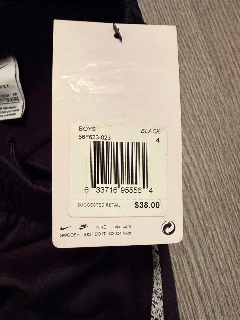 Nike Black Kids Sweatpants with White Swoosh Graphic